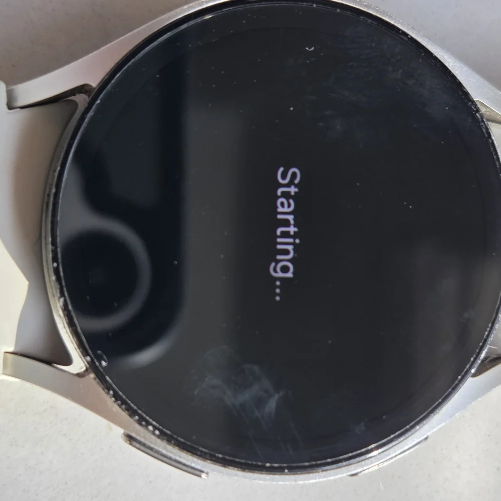 Versatile White Smartwatch with Multiple Bands